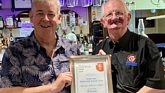 John Holden (right) is pictured with CAMRA’s Peter Alexander at an earlier award win ceremony