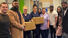 Pictured are the team from the Khau Galli delivering food to the Royal Oldham Hospital's Accident and Emergency department