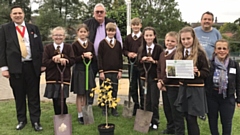 Pupils of St Josephs School, Shaw, Oldham, the Oldham Pledge to Peace Forum and officials. 
 