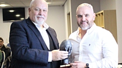 Brendan Sheridan (right) receives his clubman-of-the-year trophy from John Roddy