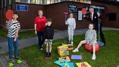 Fullcircle's Becci Drake & Redrow's Michael Deegan with the children at Sholver and Moorside junior youth club.