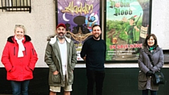 Artistic Director Chris Lawson with members of the queue to book tickets a year in advance for Robin Hood at Oldham Coliseum