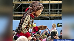 Little Amal shakes hands in Rochdale [Pic: John Cannell]