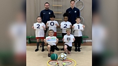 Jack Kendall (Operations Manager, back left) and Lewis Bradley (Primary PE Specialist) with students from a Dream Big Sports group