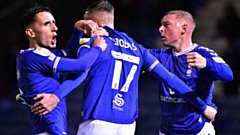 Callum Whelan, Nicky Adams and Jack Stobbs celebrate Latics' fifth goal of the game