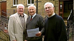 Colin Smith is pictured (left) outside the Millgate Arts Centre in Delph in 2011 during the time he was Chair of Trustees. Then stage director Ken Wright and treasurer David Shipp are also on the picture