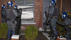 Officers carried out warrants in Oldham, Rochdale and Liverpool yesterday