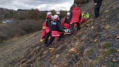 OMRT personnel immediately ascended to the young lady's location to stabilise and reassure her