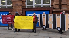 Activists from Better Buses for Greater Manchester and Acorn delivering letters in support of bus franchising to Andy Burnham\'s offices