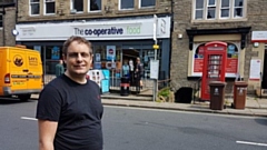 Councillor Garth Harkness is pictured in Delph