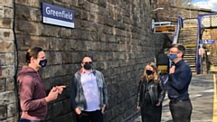 Mayor Burnham at Greenfield Station with Cllr Sean Fielding and Labour council candidates Stephanie Shuttleworth and Connor Green