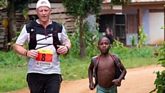 Steve Hill is pictured taking part in 2019's Uganda Marathon