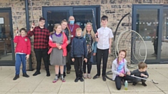 Pictured are pupils and staff at Bright Futures school getting ready for one of their regular litter picking sessions