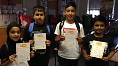 Alexandra Park Primary School children show off their Bikeability certificates