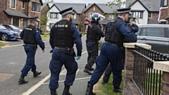 Six arrests were made following dawn raids in Greater Manchester and Buckinghamshire yesterday
