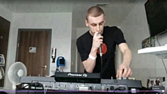 DJ Callum Wall is pictured during his live set