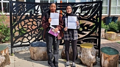 Debora Cunha Gaspar (left, 6 Grade 9s, two Grade 8s) is pictured with Khanees Azam (two Grade 9s, four Grade 8s and three Grade 7s)