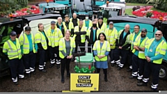 Cllr Arooj Shah and Cllr Amanda Chadderton with crew and vehicles