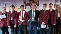 Mark Giles, Hathershaw’s Principal, is pictured with some of his successful students
