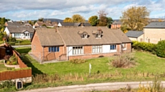 The famous old 'House on the Lake' which is now being offered for sale by Oldham estate agent Cornerstone