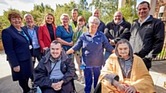 Victor, front right, is joined by Allison Keegan, Advanced Care Practitioner (centre) representatives of Novus, Morgan Sindall Group, Kathy Cowell OBE, Chairman of MFT (far left) who is next to Chief Executive of North Manchester General Hospital Ian Lurcock