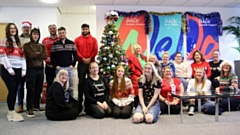 WeDo staff in their Christmas jumpers