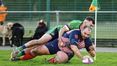 Andy Joy crashes over for one of his two Oldham tries