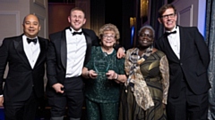 Jill Dodge is pictured (centre) with her award