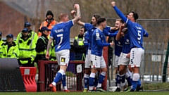 Hallam Hope celebrates scoring Latics' first goal of the game