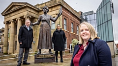 Oldham Council Chief Executive Harry Catherall, Council Leader Cllr Arooj Shah, and Deputy Leader Amanda Chadderton at the Annie Kenney statue in Parliament Square