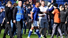 Fans on the pitch