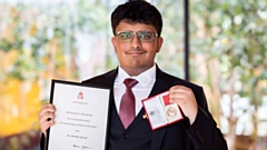 Proud Ibrahim Yousaf with his medal. Image courtesy of Darren Robinson