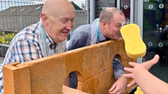 Councillor Eddie Moores (left) gets a soaking at the summer carnival