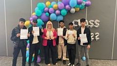 The Oldham Academy North Headteacher Rachael Hallam with some of her delighted students this morning