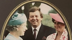 The Queen is pictured with John Battye and his wife, Annette
