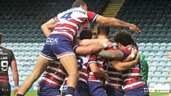 Oldham's players celebrate one of their four tries. Image courtesy of ORLFC