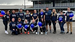 Pictured are the Ryder and Dutton team outside the school during their sponsored walk