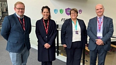 Oldham Academy North Headteacher Jessica Giraud is pictured (second from right) with the Eton Connect representatives