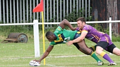Winger Mo Agoro scores a try for Oldham a decade ago