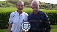 Mike Smith and John Wood are pictured with the Oldham Gems Autumn Shield