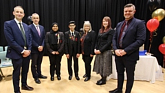Welcoming the special guest: Headteacher and Deputy Heads, Head Girl Intia Hossain and Head Boy Waizz Tufail, former Year Manager Claire Imeson, and Krystian Liptrot