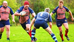 Oldham's Cameron Wood in full flight against Liverpool Collegiate