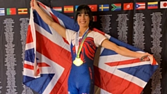 Samantha Travis shows off her gold medal during her successful trip to Orlando