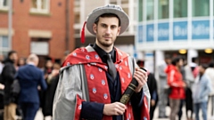 New University of Central Lancashire doctorate Steven Gough-Kelly in his PhD cap and gown