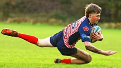 Jenson Hamilton dives over to score Oldham's sole try