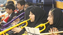 Radclyffe students performing as part of an orchestra