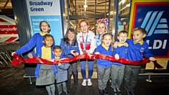 Team GB hockey hero Sarah Jones cut the all-important red ribbon alongside pupils from nearby St Luke's CE Primary School and Aldi colleague of 33 years, MarIa Holder