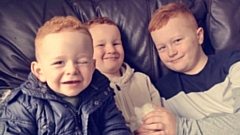 Freddie is pictured (left) with Braydn and Archie