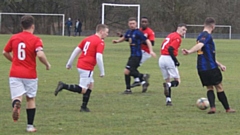 Action from the game between Shaw Athletic and Stretford Paddock, which Athletic won 5-1