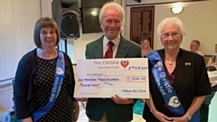 John Wood is pictured (centre) with Heather Hall, Treasurer, and Jean Depledge, Chairman